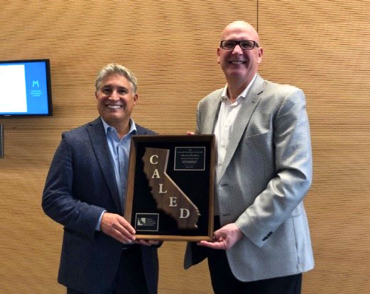 Larry Accepting Redondo Award with Steven Proud